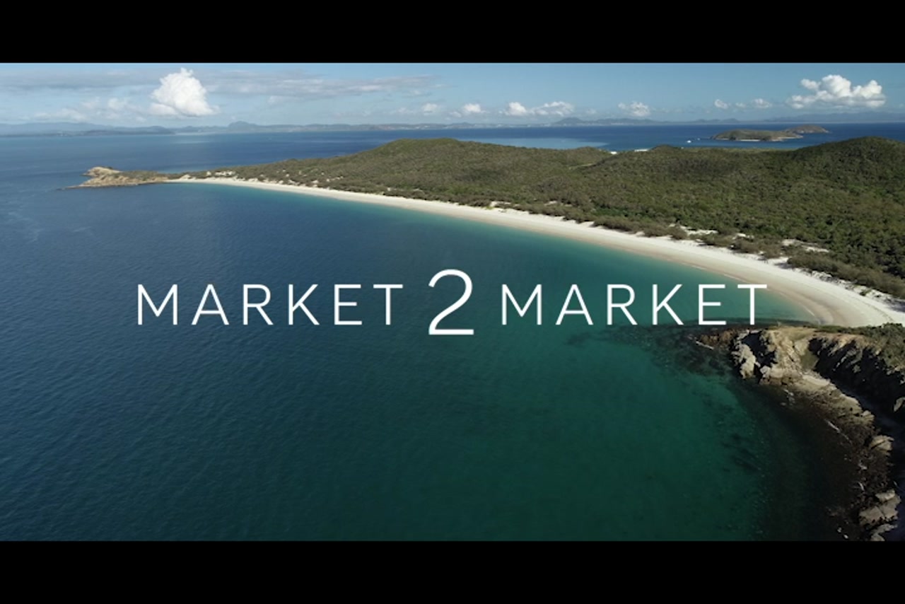 Aerial footage over coastline and beaches of Great Keppel Island