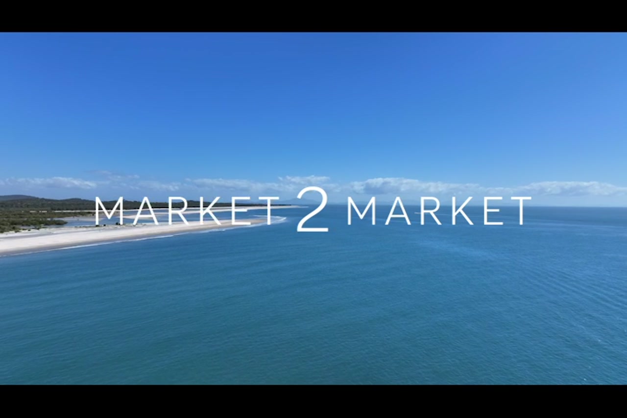 Aerial footage of coastline and ocean off Curtis Island
