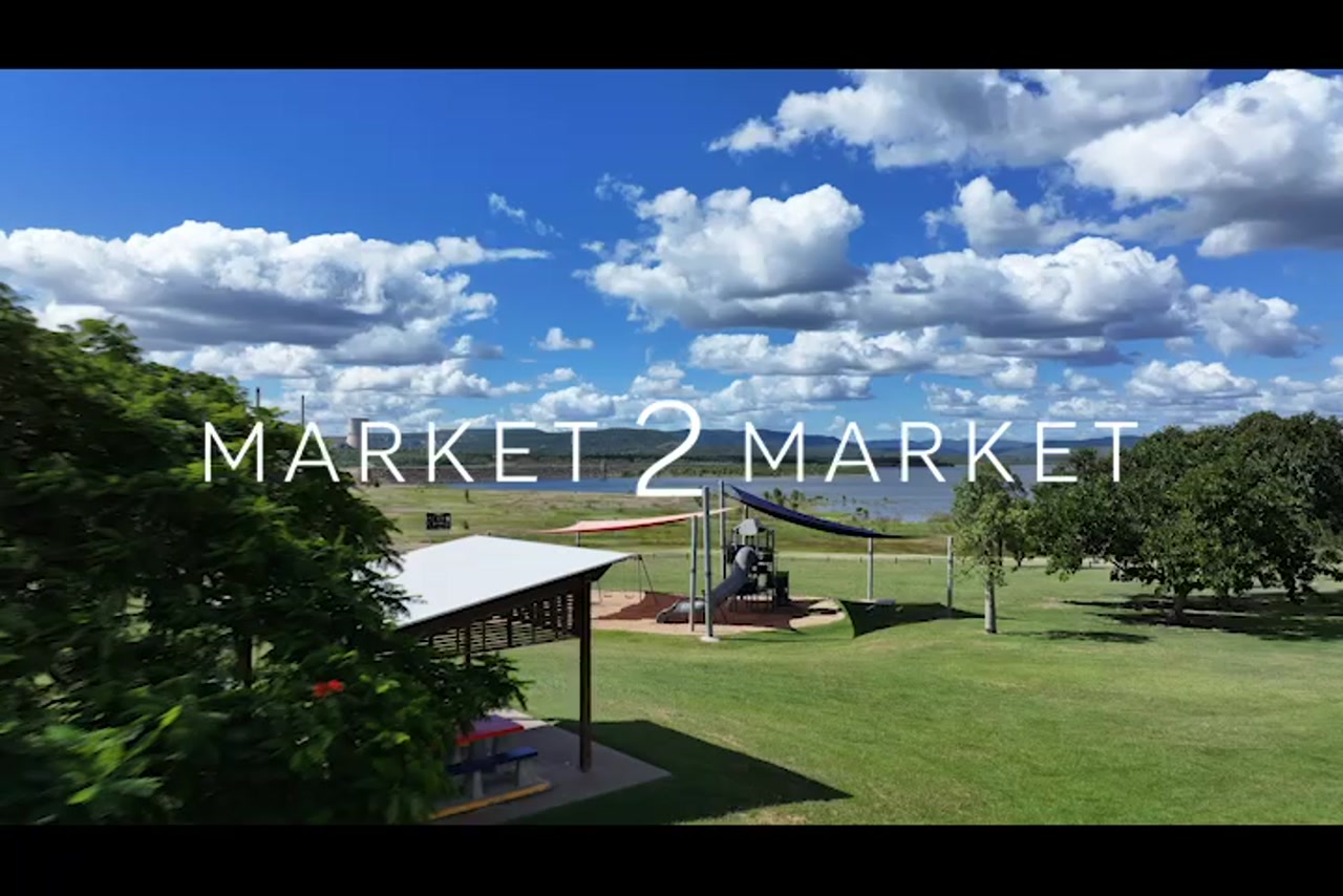 Aerial footage over picnic area and playground beside Awoonga Lake, Gladstone area