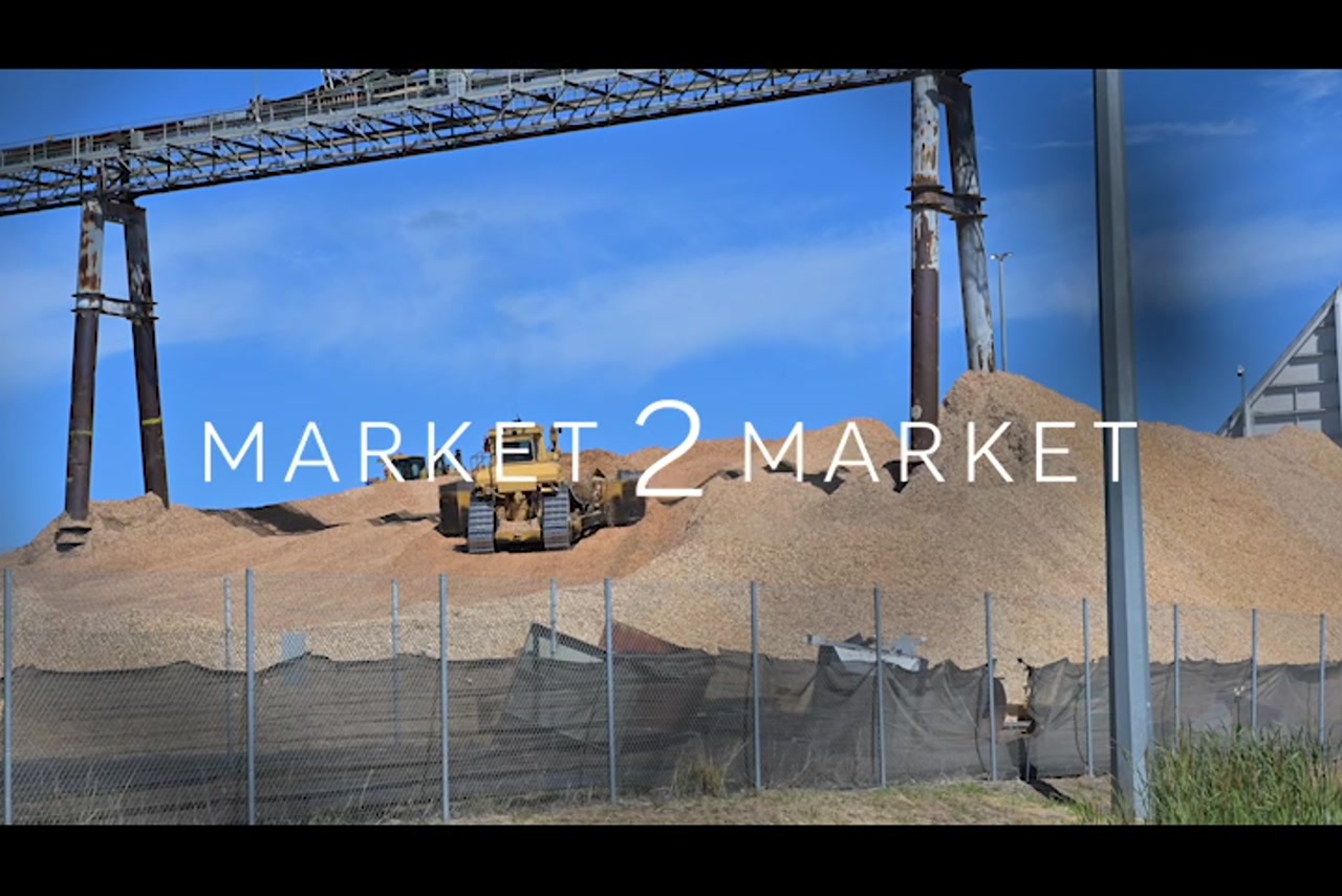 Bulldozer Moving Woodchips – Port of Brisbane